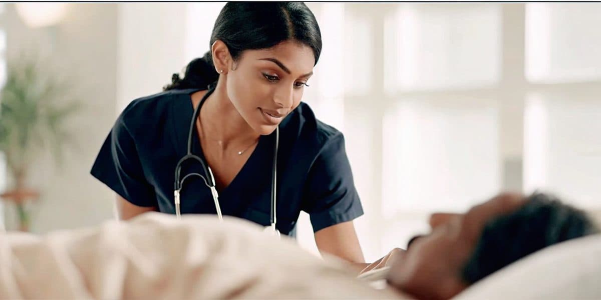 Registered nurse caring for a patient in a clinical setting